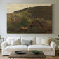 Canvas art print detailing a romantic landscape with depth and layered hills, centered above a sofa as a large focal wall piece