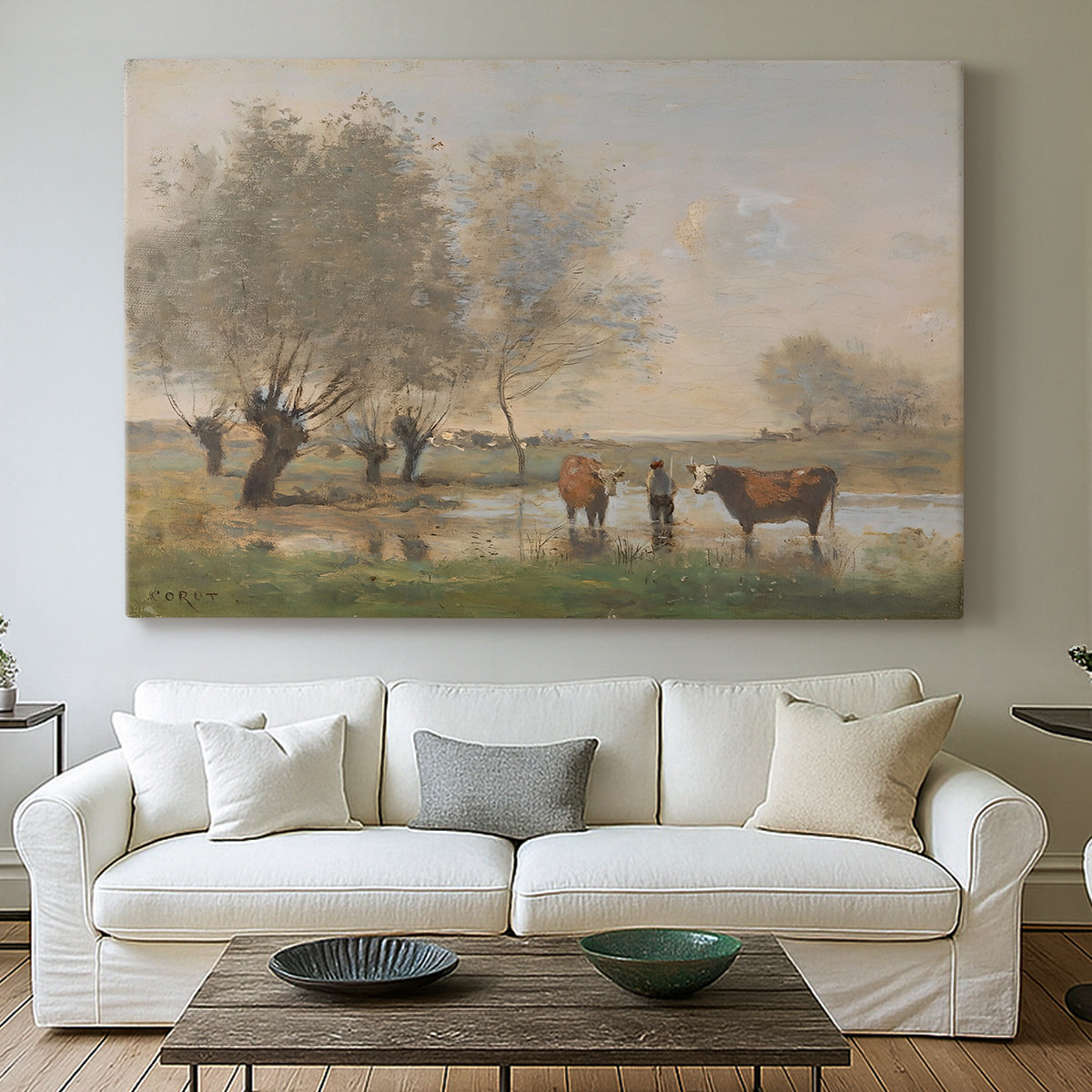 Canvas art print detailing a countryside setting with cows in damp environment, centered above a sofa as a large focal wall piece