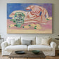 Canvas art print detailing a stylized figure study with decorative color blocks, centered above a sofa as a large focal wall piece