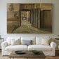 Canvas art print detailing an interior setting with figures positioned near doorway, centered above a sofa as a large focal wall piece