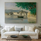 Canvas art print detailing a tranquil scene combining buildings, water, and sky, centered above a sofa as a large focal wall piece
