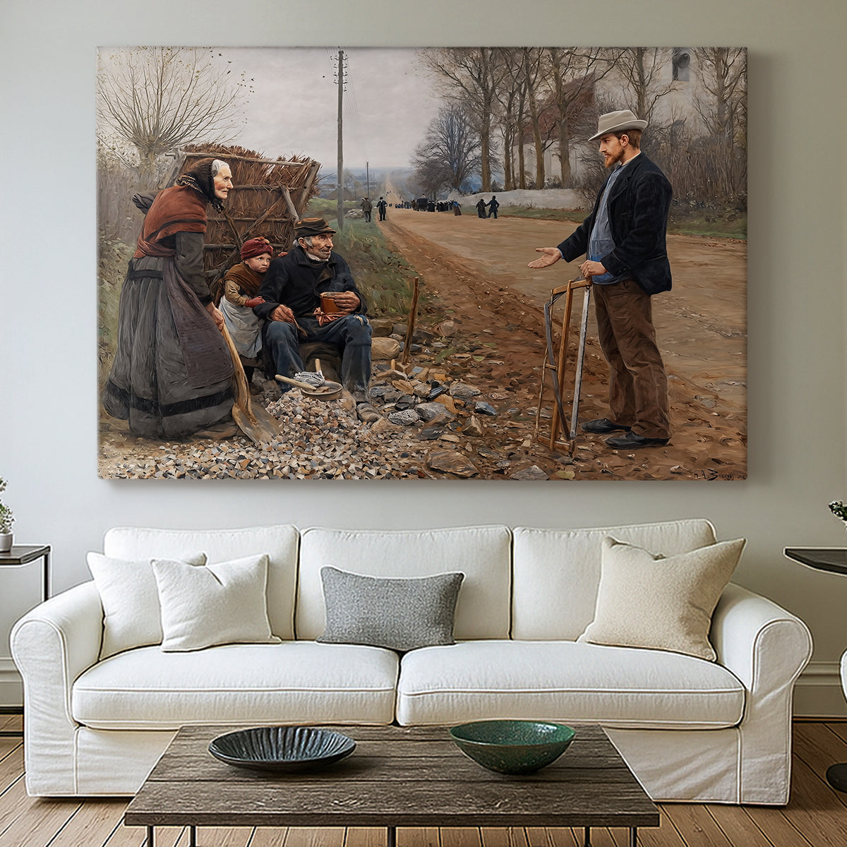 Canvas art print detailing a rustic landscape with figures along open road, centered above a sofa as a large focal wall piece