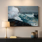 Canvas art print detailing a storm-driven seascape with dark clouds and rough surf, mounted in a softly lit interior space