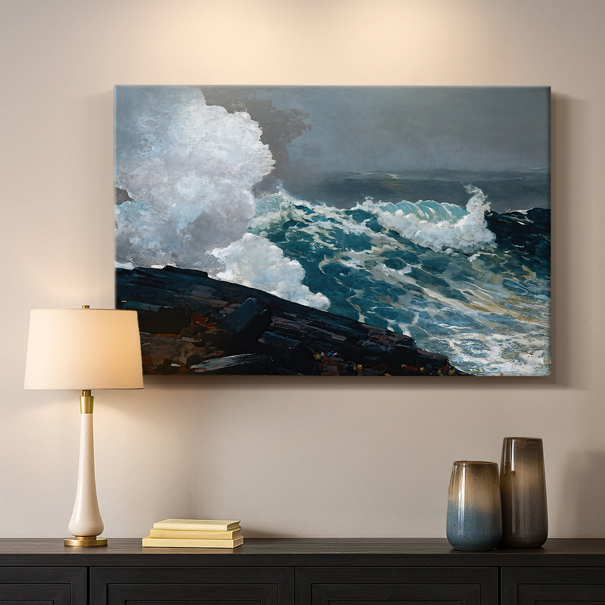 Canvas art print detailing a storm-driven seascape with dark clouds and rough surf, mounted in a softly lit interior space
