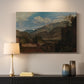 Canvas art print detailing a scenic mountain setting, mounted in a softly lit interior space
