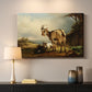 Canvas art print detailing realistic goats in field, mounted in a softly lit interior space