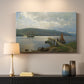 Canvas art print detailing a seaside setting with jetty and quiet water, mounted in a softly lit interior space