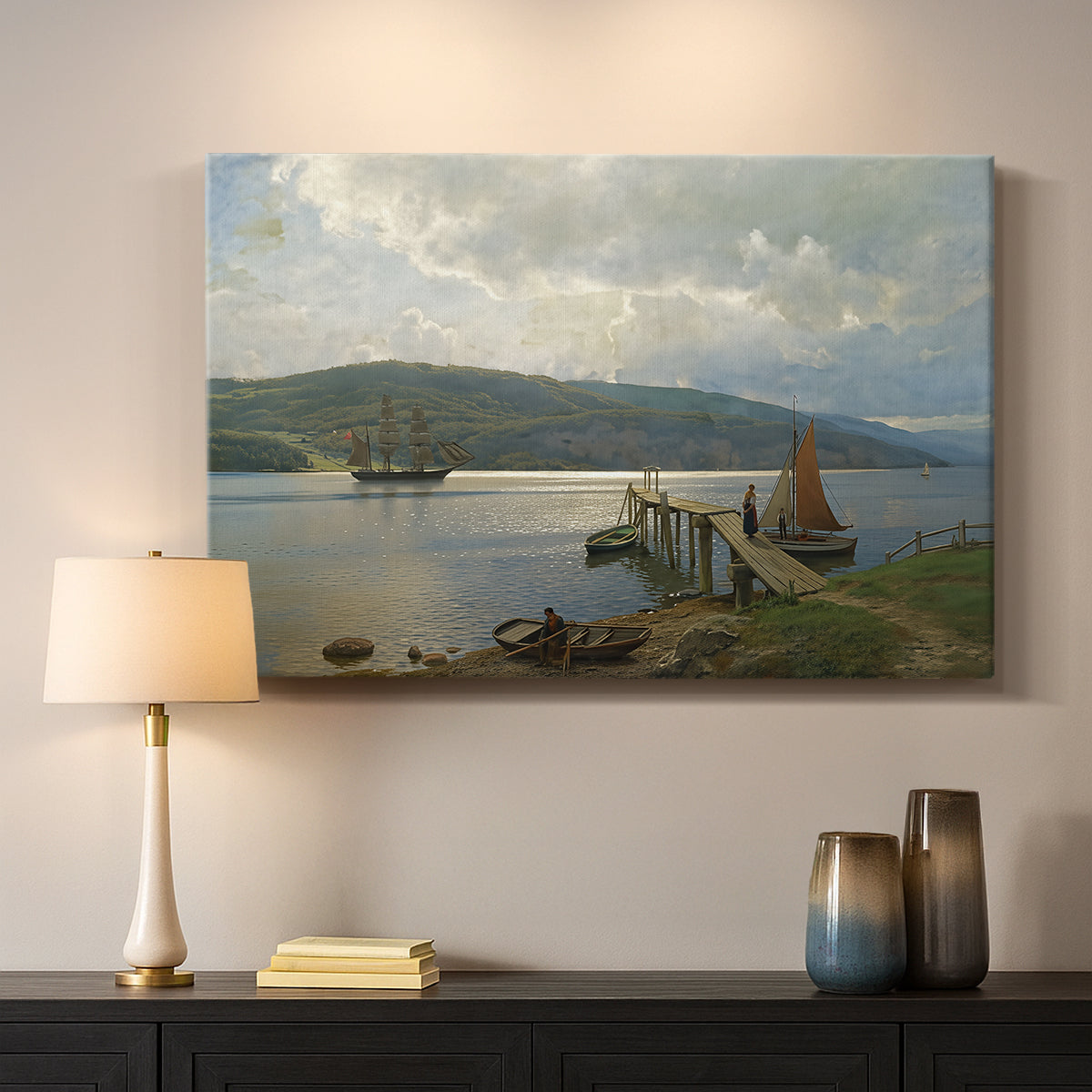 Canvas art print detailing a seaside setting with jetty and quiet water, mounted in a softly lit interior space