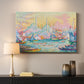 Canvas art print detailing a coastal cityscape, mounted in a softly lit interior space