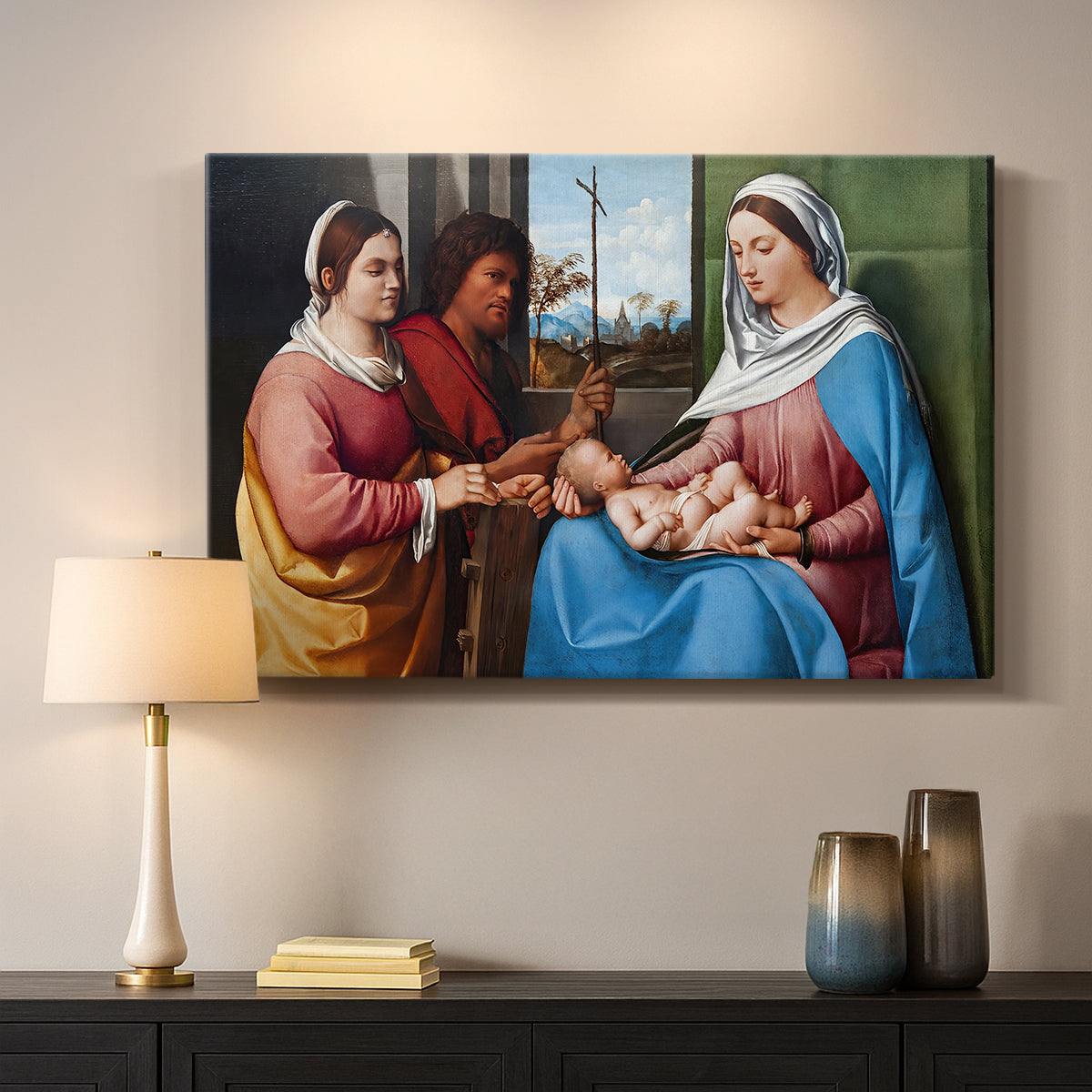 Canvas art print detailing a classical scene with people posed in harmonious outdoor setting, mounted in a softly lit interior space
