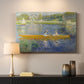 Canvas art print detailing a leisure scene of figures in a small rowboat on tranquil water, mounted in a softly lit interior space