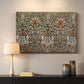 Canvas art print detailing a botanical motif with repeating curved stems on dark ground, mounted in a softly lit interior space