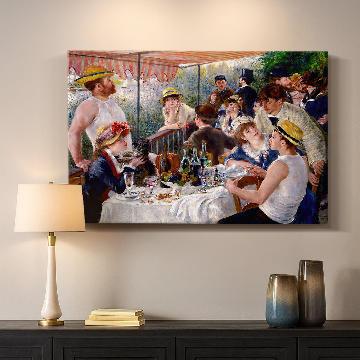 Canvas art print detailing a social dining scene with figures seated around table on riverside terrace, mounted in a softly lit interior space