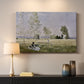 Canvas art print detailing a tranquil summer landscape with lone figure in nature, mounted in a softly lit interior space