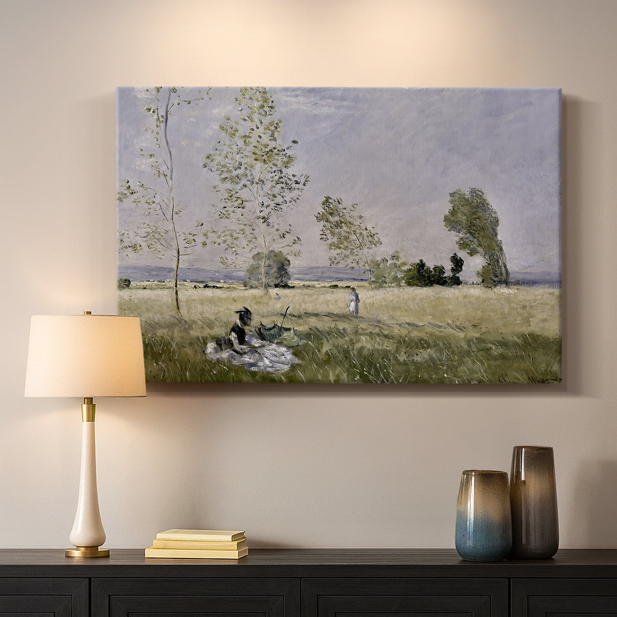 Canvas art print detailing a tranquil summer landscape with lone figure in nature, mounted in a softly lit interior space