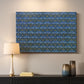 Canvas art print detailing a textile-style surface filled with small leaves and blossoms, mounted in a softly lit interior space