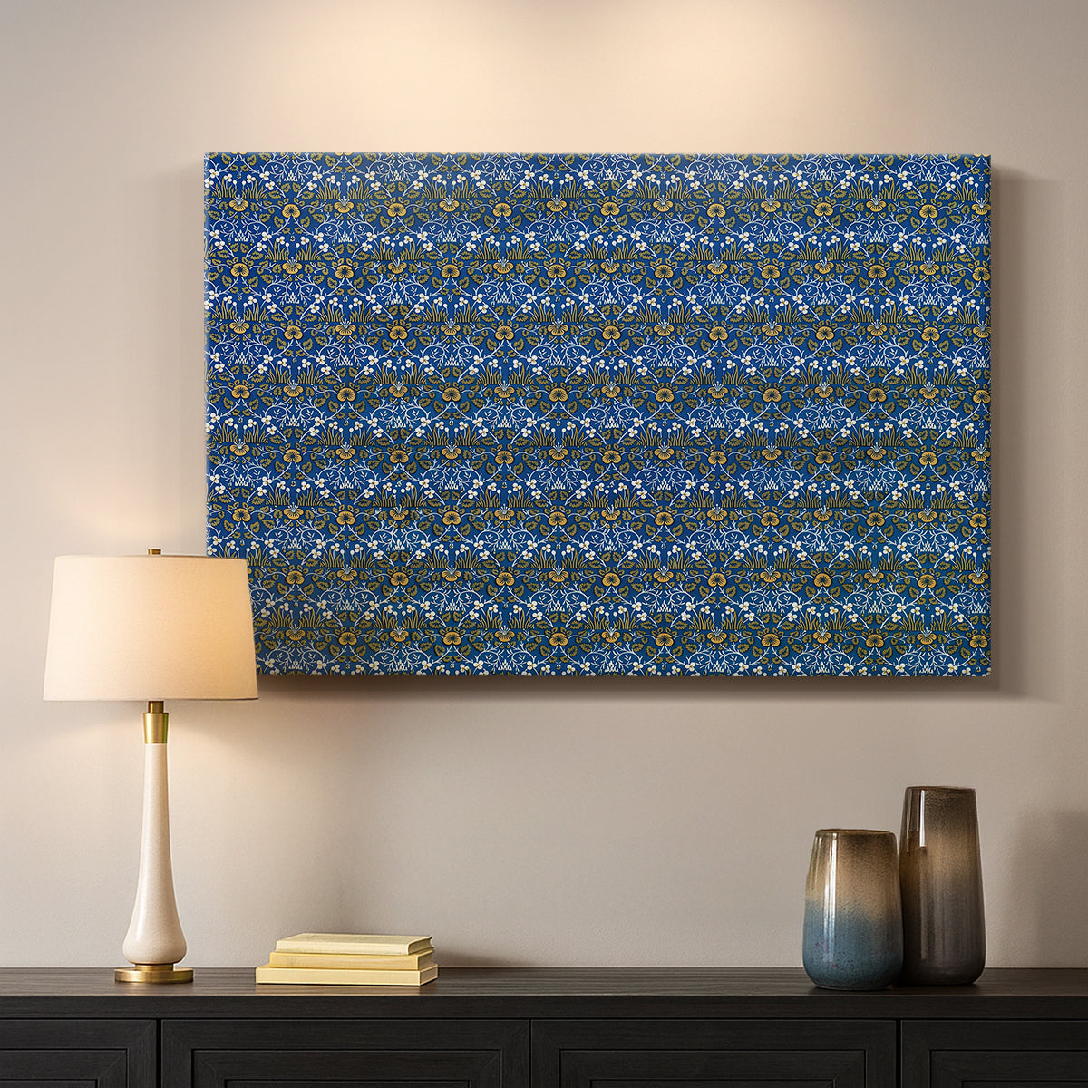 Canvas art print detailing a textile-style surface filled with small leaves and blossoms, mounted in a softly lit interior space