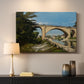 Canvas art print detailing an industrial structure integrated into natural landscape, mounted in a softly lit interior space