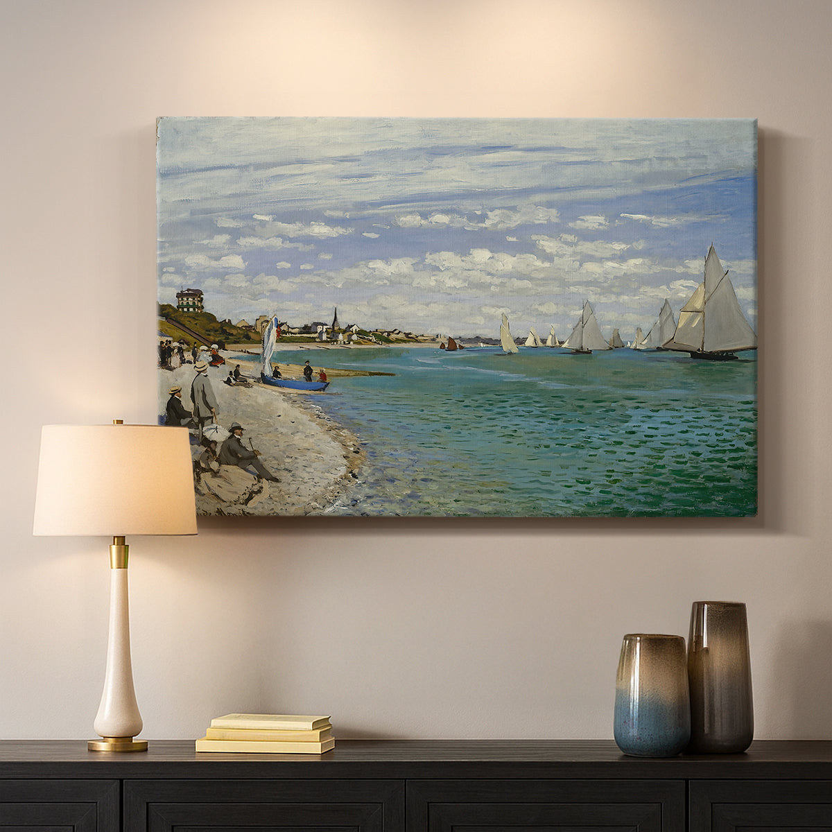 Canvas art print detailing a nautical scene with boats racing near seaside town, mounted in a softly lit interior space