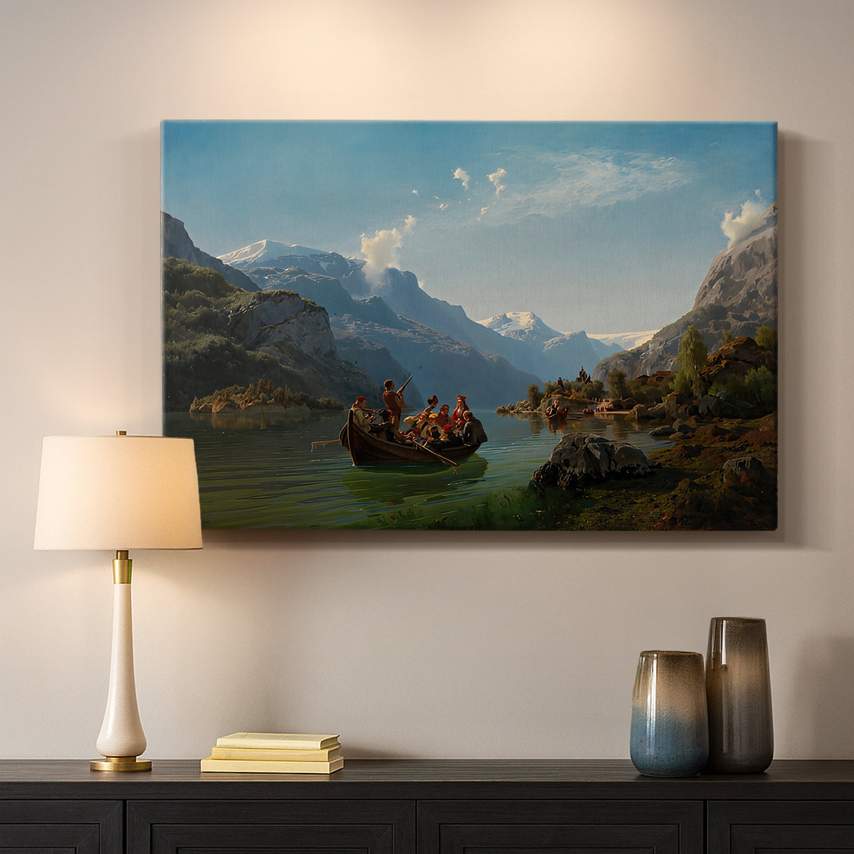 Canvas art print detailing a romantic landscape of boats on calm water beneath steep cliffs and mountains, mounted in a softly lit interior space