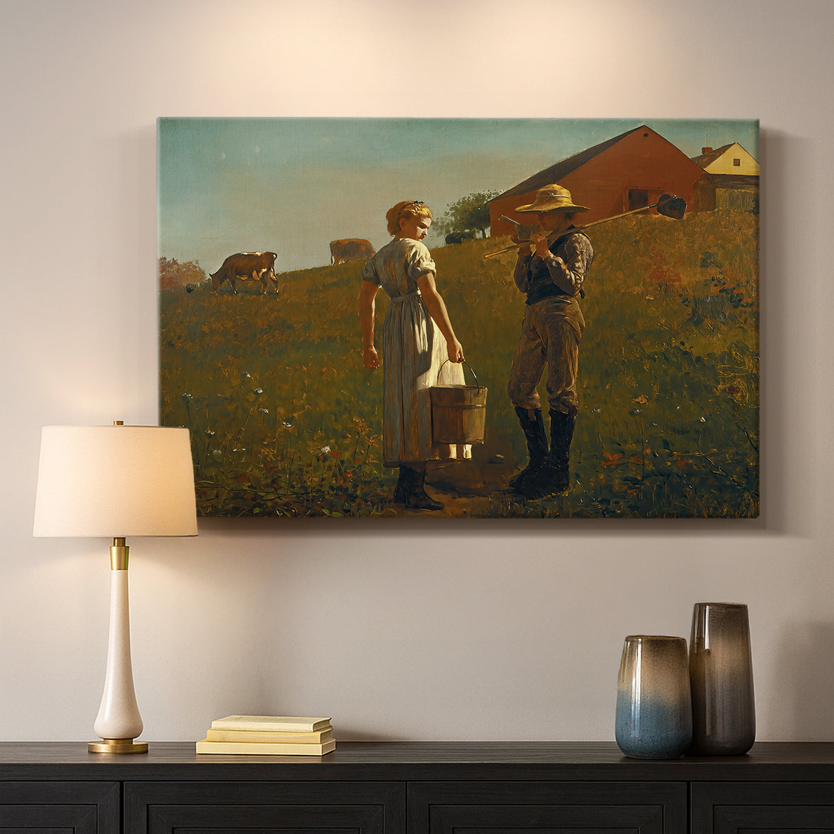 Canvas art print detailing an open field setting with human interaction and distant horizon, mounted in a softly lit interior space