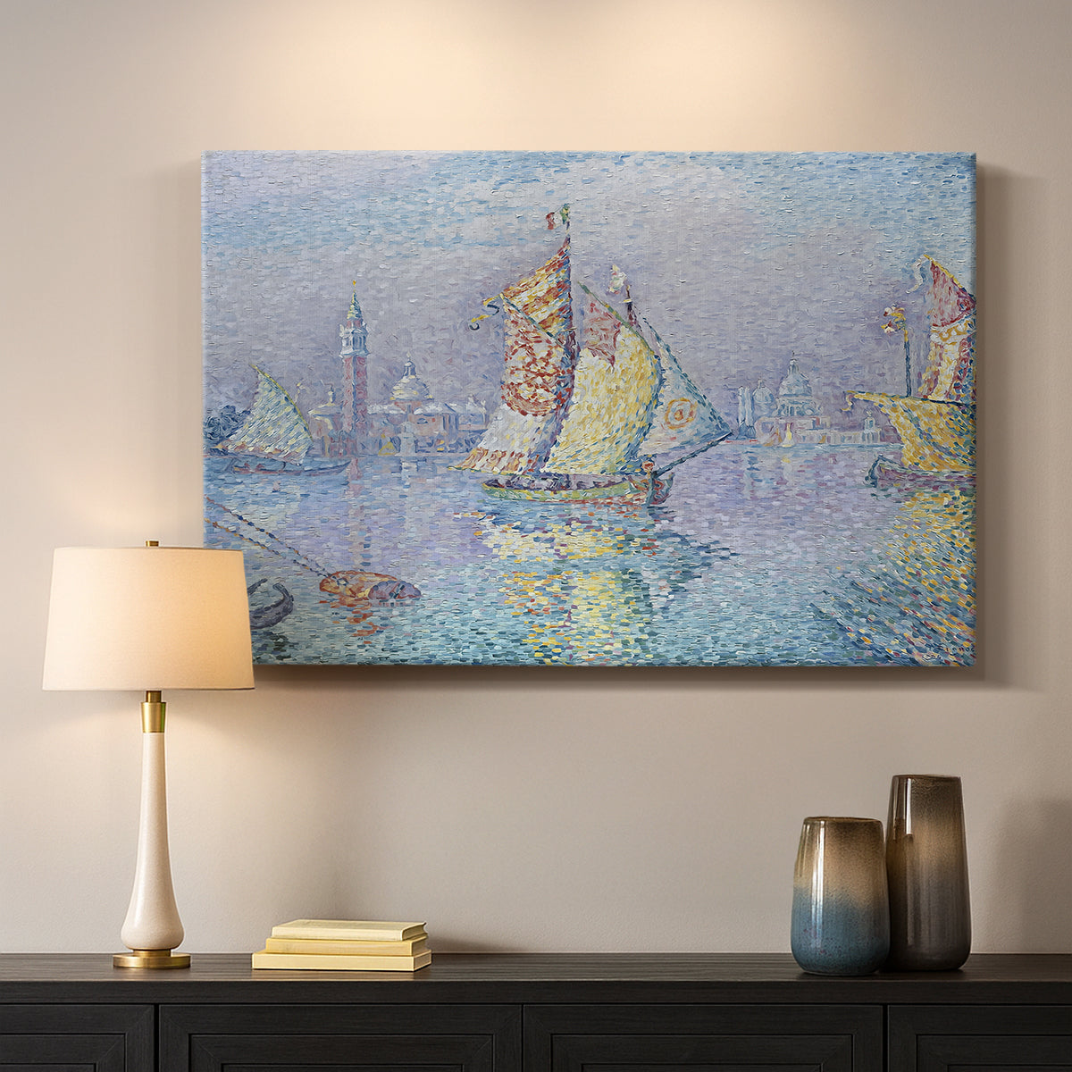 Canvas art print detailing a maritime view with sailboat, mounted in a softly lit interior space