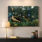 Canvas art print detailing a dreamlike setting with reclining woman in dense greenery, mounted in a softly lit interior space
