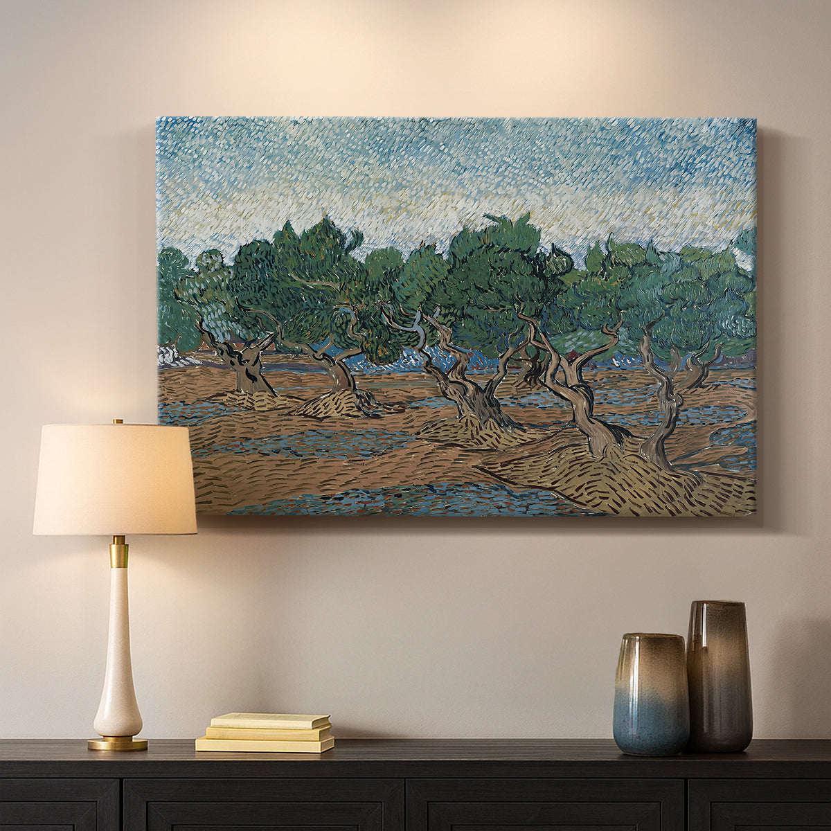 Canvas art print detailing a countryside composition with trees and dynamic color, mounted in a softly lit interior space