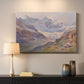 Canvas art print detailing an expansive alpine view with ice and distant mountains, mounted in a softly lit interior space