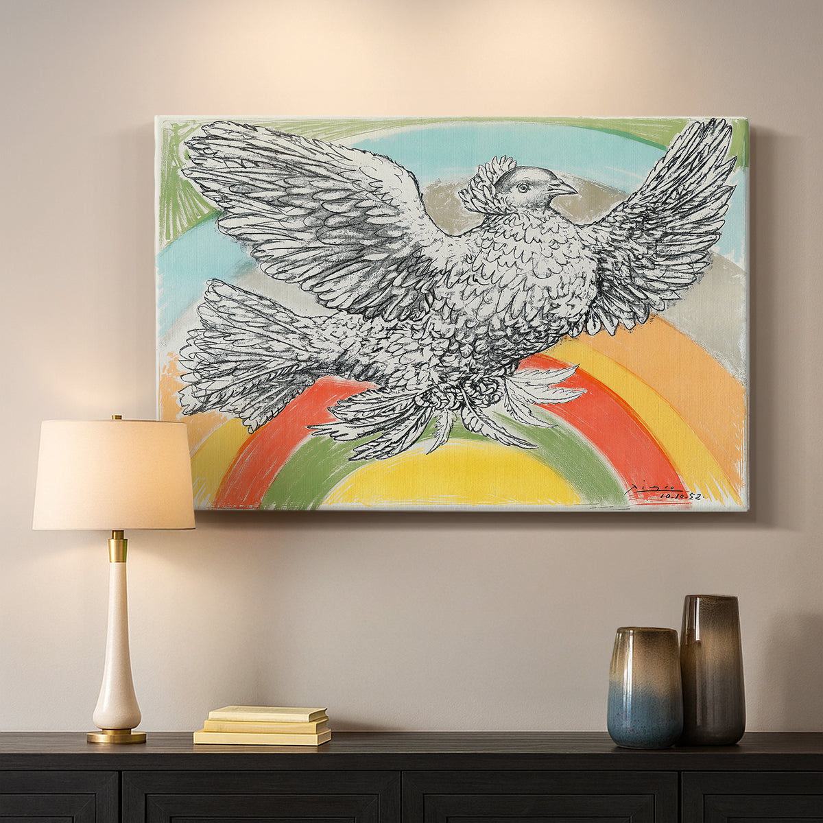 Canvas art print detailing a graphic depiction of bird with rainbow, mounted in a softly lit interior space