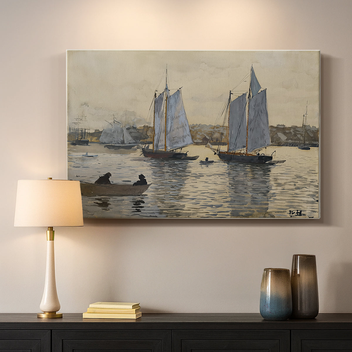 Canvas art print detailing a coastal view featuring two schooners under clear sky, mounted in a softly lit interior space