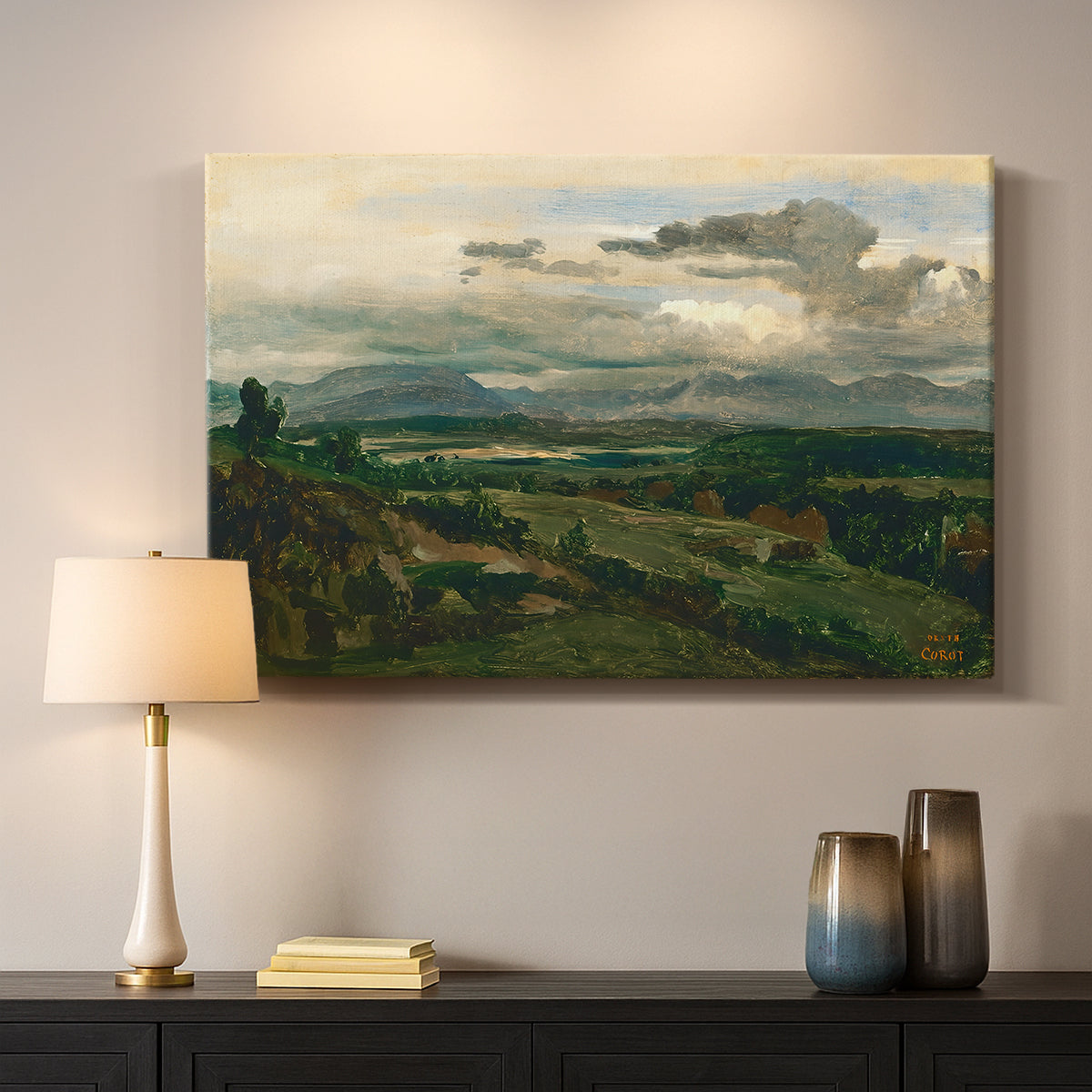 Canvas art print detailing a tranquil scene combining town and natural surroundings, mounted in a softly lit interior space