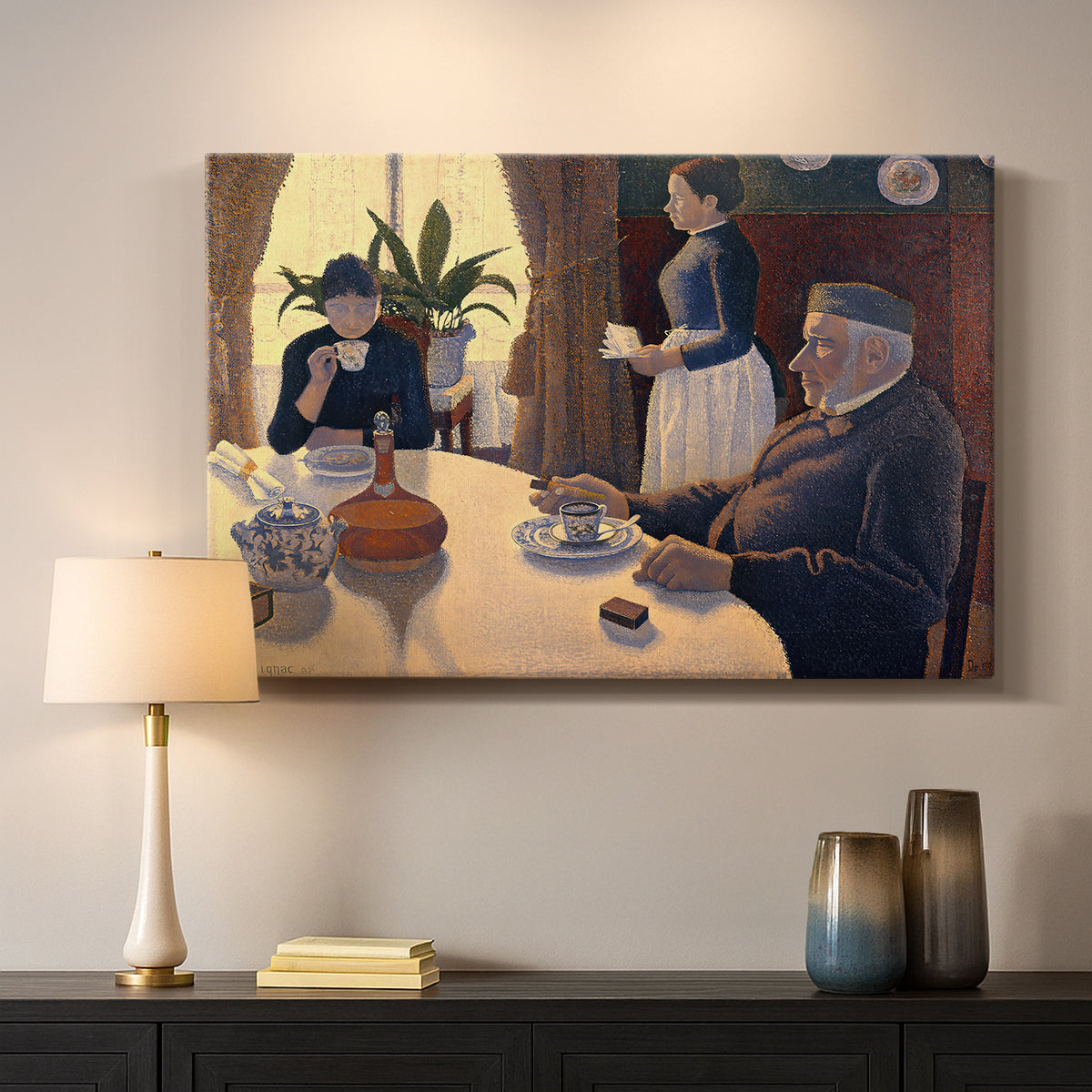 Canvas art print detailing a pointillist social gathering indoors, mounted in a softly lit interior space