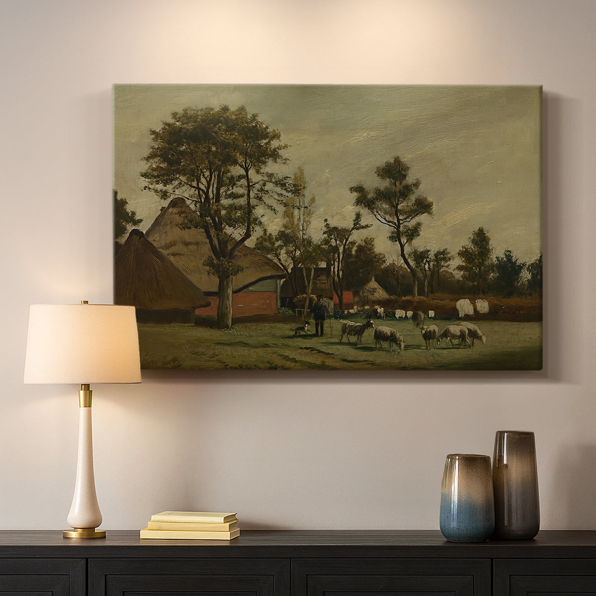 Canvas art print detailing a countryside composition with architecture and animals, mounted in a softly lit interior space