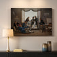 Canvas art print detailing multiple figures arranged in room with classical decor, mounted in a softly lit interior space