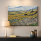 Canvas art print detailing a countryside composition showing agricultural labor in enclosed field, mounted in a softly lit interior space