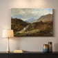 Canvas art print detailing a romantic depiction of mountainous environment, mounted in a softly lit interior space