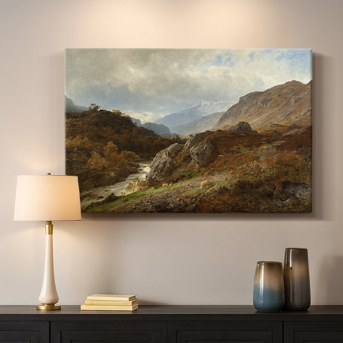 Canvas art print detailing a romantic depiction of mountainous environment, mounted in a softly lit interior space