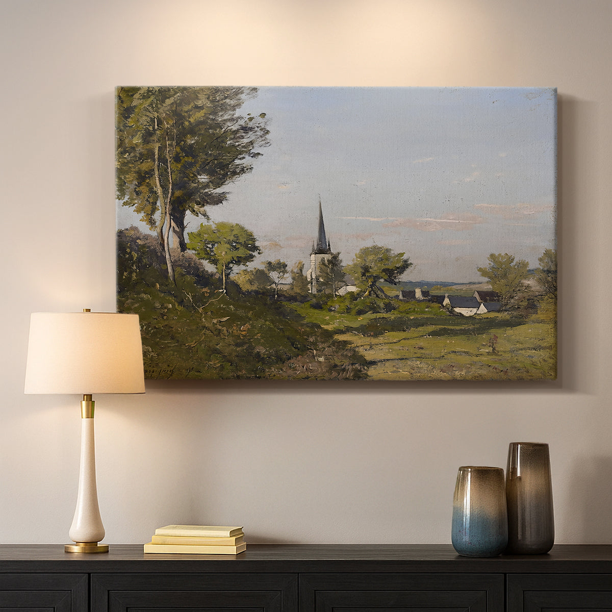 Canvas art print detailing a pastoral view with church structure in natural setting, mounted in a softly lit interior space