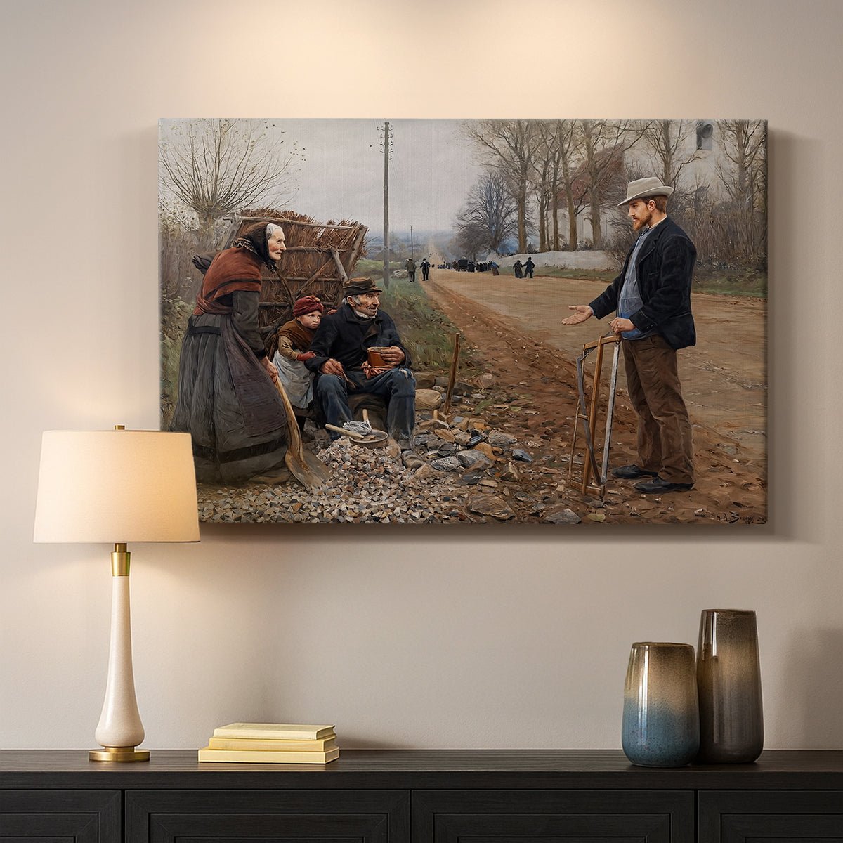 Canvas art print detailing a rustic landscape with figures along open road, mounted in a softly lit interior space