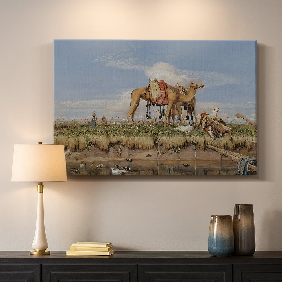 Canvas art print detailing an atmospheric Nile view with figures and shoreline, mounted in a softly lit interior space