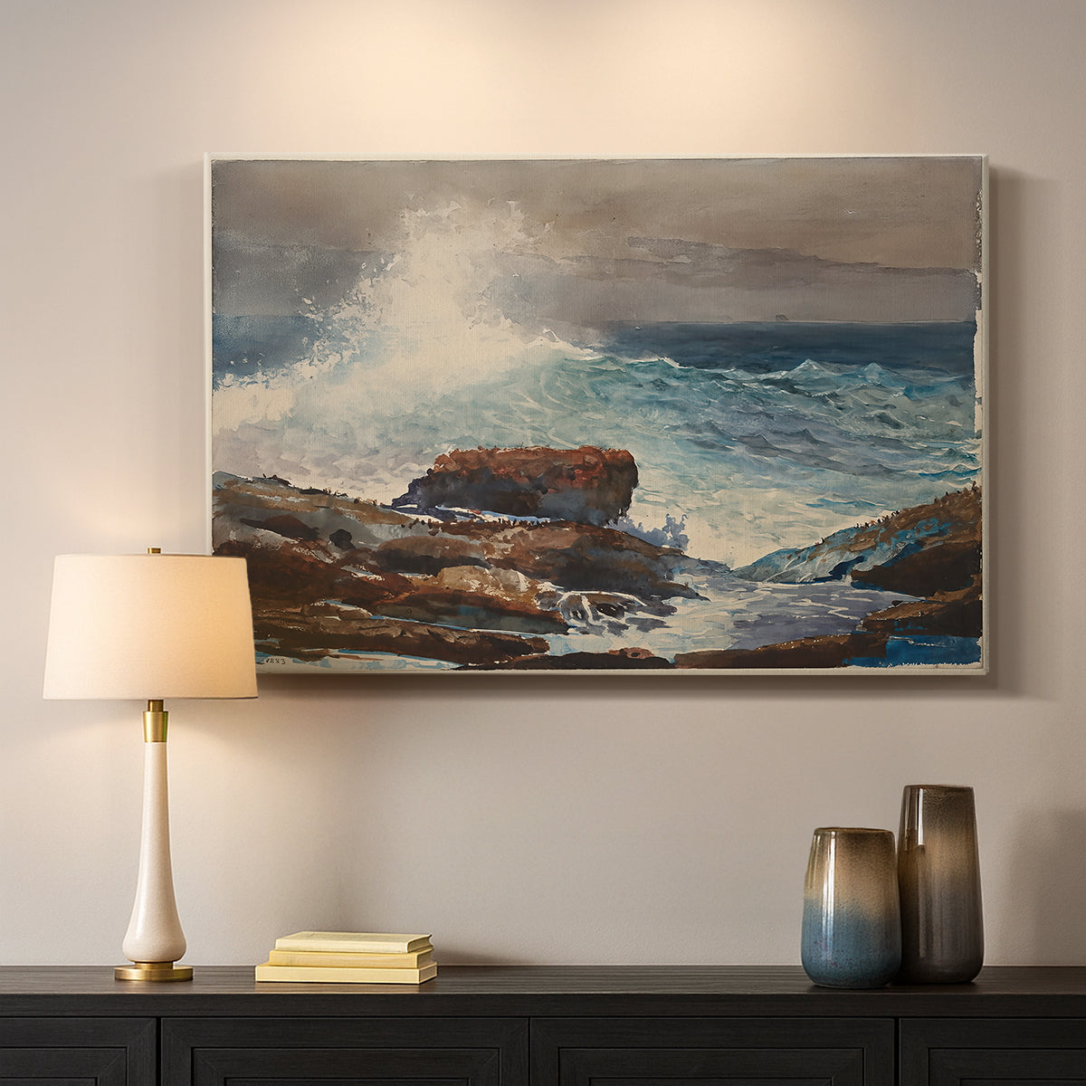 Canvas art print detailing a shoreline view with surf and coastal elements, mounted in a softly lit interior space