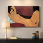 Canvas art print detailing an expressionist painting of nude woman reclining with minimal background, mounted in a softly lit interior space