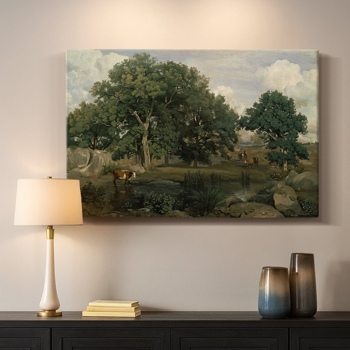 Canvas art print detailing a tranquil forest setting with atmospheric light, mounted in a softly lit interior space