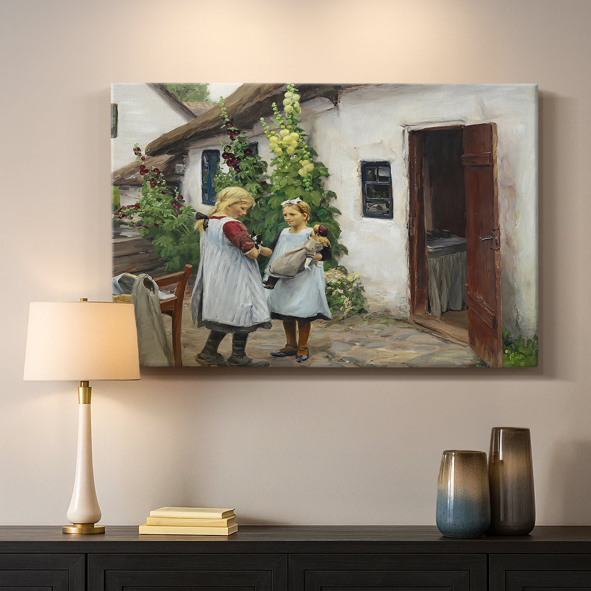 Canvas art print detailing a farmhouse exterior with figures engaged in everyday moment, mounted in a softly lit interior space