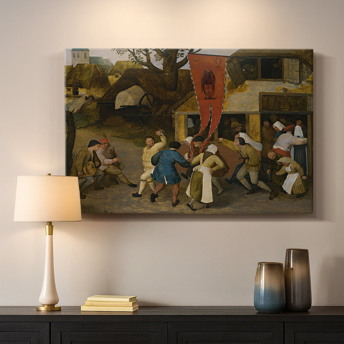 Canvas art print detailing a traditional celebration in rural scene, mounted in a softly lit interior space