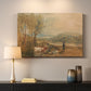 Canvas art print detailing a landscape featuring castle, mounted in a softly lit interior space