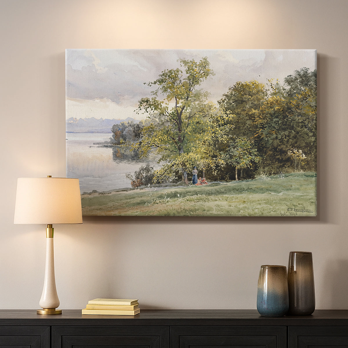 Canvas art print detailing a tranquil lakeside view with soft atmospheric tones, mounted in a softly lit interior space