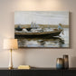 Canvas art print detailing a quiet boating scene with figures centered in frame, mounted in a softly lit interior space