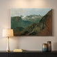 Canvas art print detailing a rugged terrain view, mounted in a softly lit interior space
